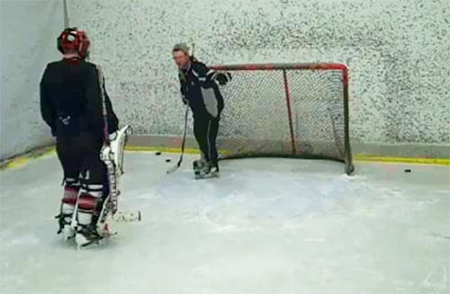 Getting some pointers from my goalie coach